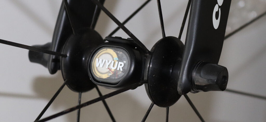 NPE WYUR Review CORD ANT Bluetooth conversion sports sensor on a bike front wheel